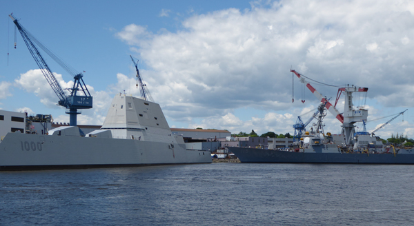 two naval vessels being built
